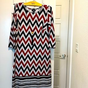 Small chevron ladies dress with a tassel necklace